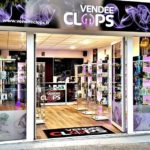 Enseigne façade Vendée Clops aux couleurs noir, violet et blanc